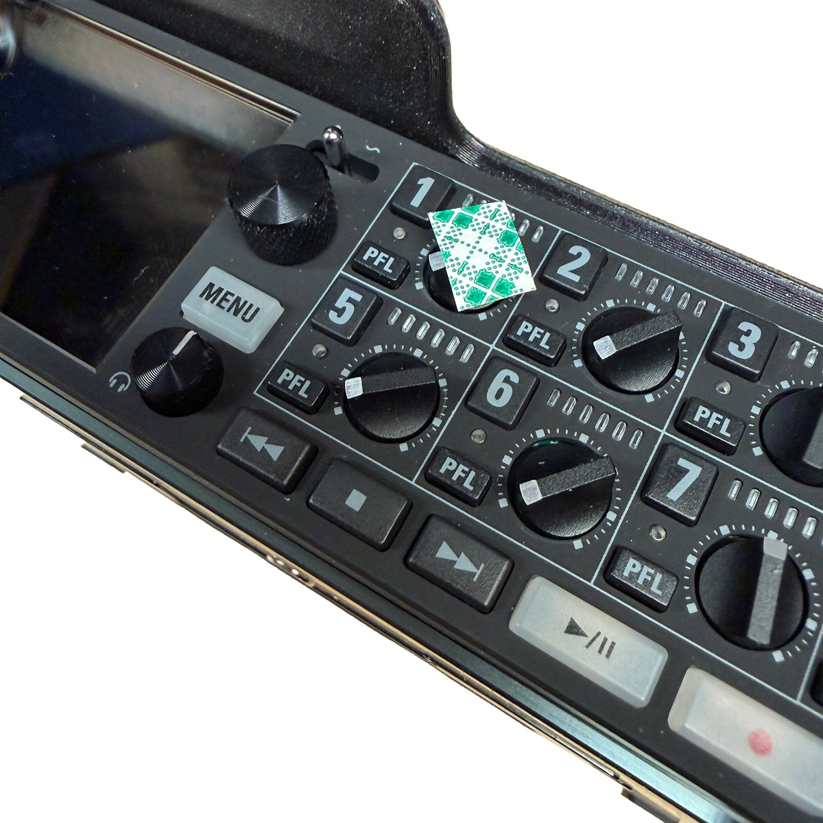 Control panel of a audio device with buttons and knobs on a white background